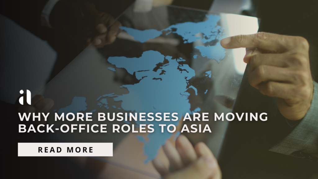 Business team holding world map