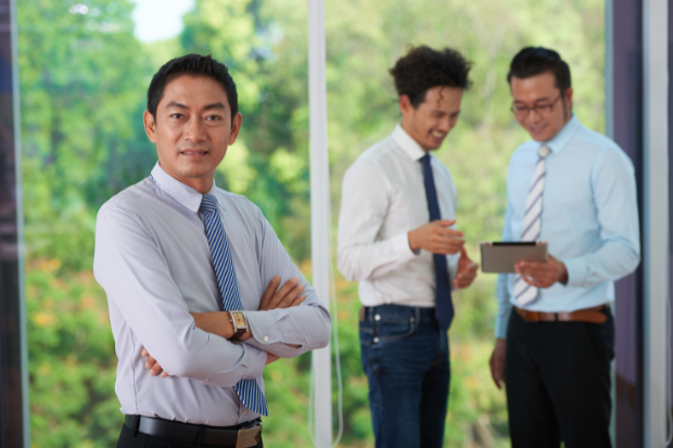 Successful entrepreneur men in background